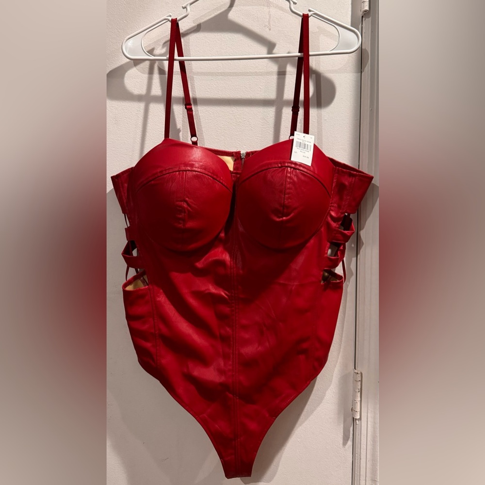 Red bodysuit from Rainbow Shops, Never used. Perfect for clubbing.
